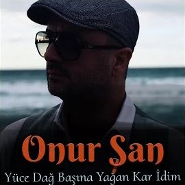 Onur Şan – Yüce Dağ Başına Yağan Kar İdim Mp3 Dinle & İndir | Mp3sayar